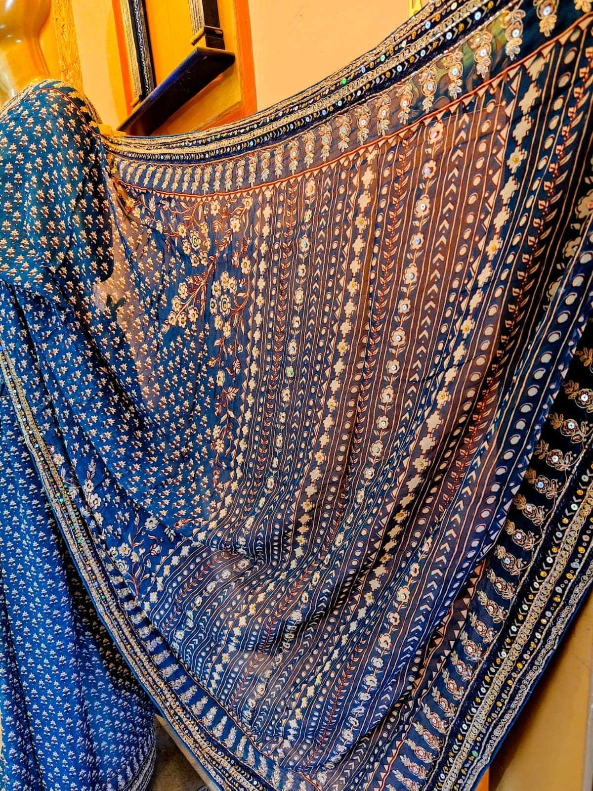 Close-up of the pallu embroidery and mirrors